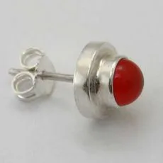 Side view of a handcrafted 925 sterling silver stud earring featuring a vibrant red carnelian cabochon set in a stepped tiered bezel with a friction backing post.