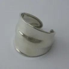 Artisan-crafted 925 sterling silver wide-profile open ring featuring a smooth, fluid wave design and a polished finish.