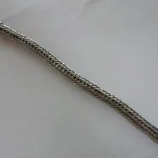 Artisan-crafted 925 sterling silver Balinese chain bracelet featuring a heavy, hand-woven Dragonspine mesh design with decorative silver end caps and a hook clasp.