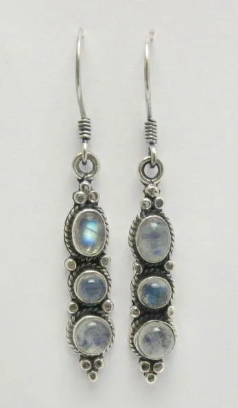 A pair of artisan-crafted dangle earrings featuring three vertical oval moonstone gems set in 925 sterling silver with intricate twisted wire detailing and hook backings.
