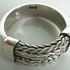 Artisan-crafted 925 sterling silver statement ring featuring an intricate multi-strand woven braid design flanked by smooth polished end-caps.